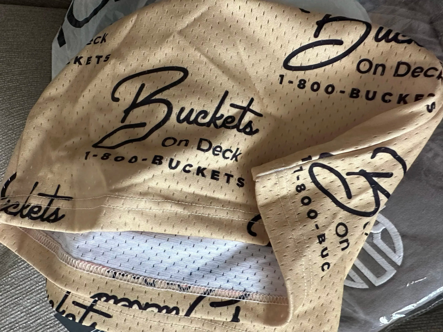 Beige and Black 1-800-buckets mesh shorts