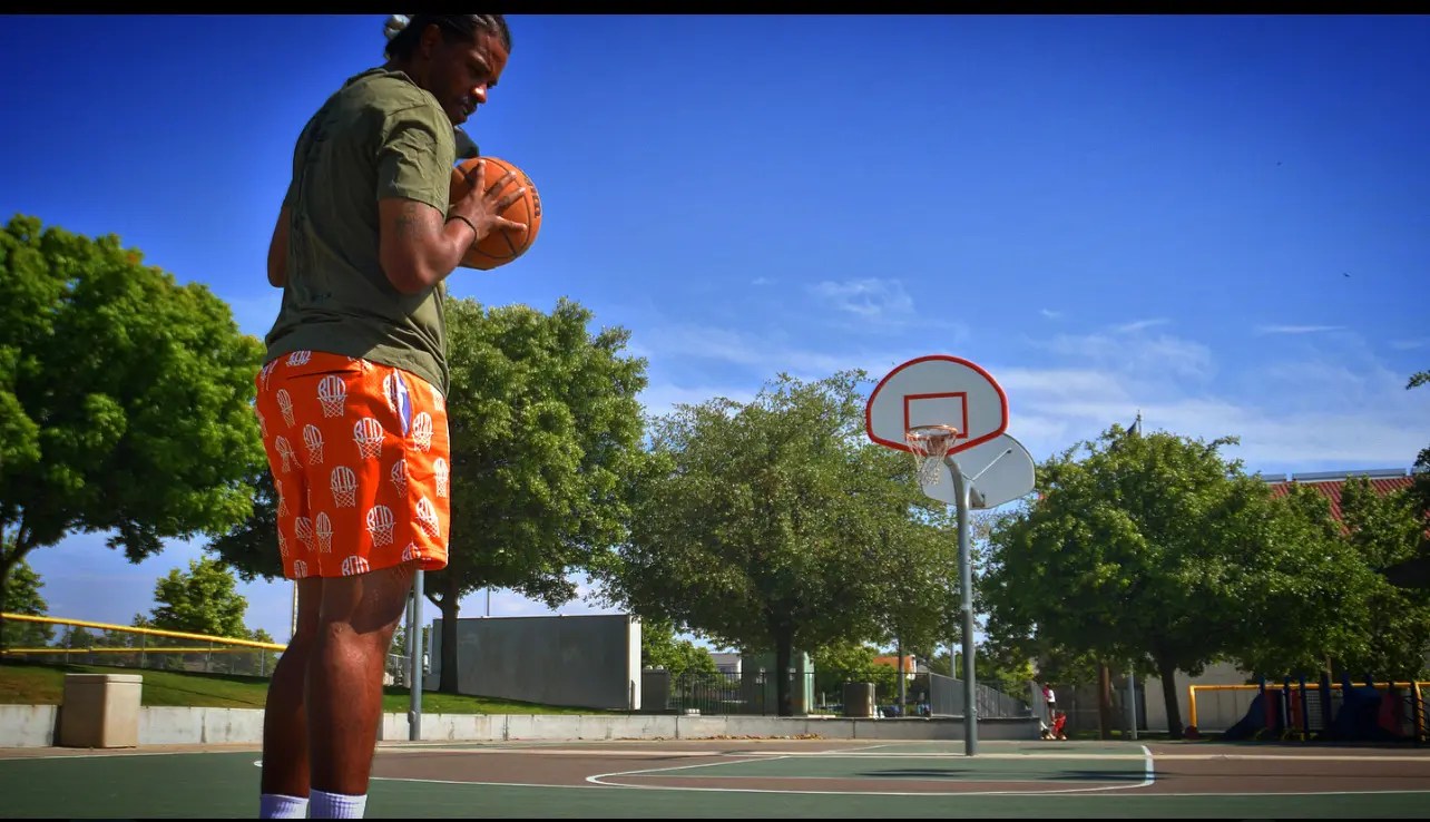 orange and white bod basket logo mesh shorts-park
